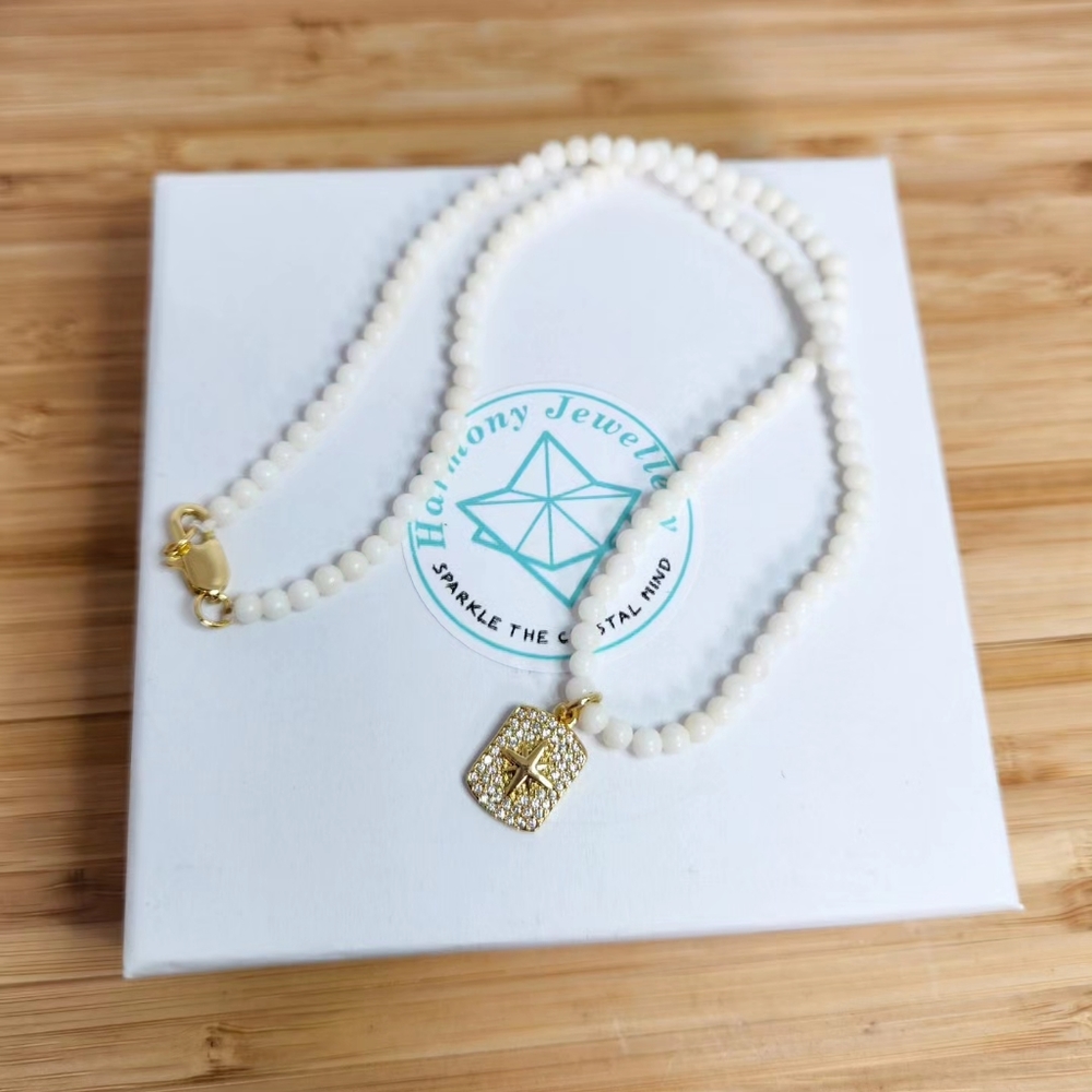 4 mm White Coral with Gold-Plated charm necklace